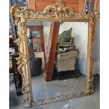 A 19th century Rococo style overmantle mirror with gesso moulded decoration (AF), height 158cm.