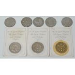Eight Queen Elizabeth II £5 coins.