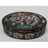 An Imperial Russian silver gilt and cloisonne enamel oval hinge lidded snuff box, foliate decorated,