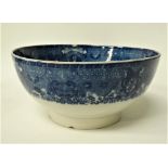 An 18th century chinoiserie blue and white transfer printed bowl, diameter 22.5cm.