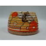 A Clarice Cliff 'Bizarre' condiment pot, beehive moulded and foliate painted, diameter 7cm.