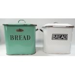 Two enamel metal lidded bread bins.