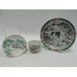 A Chinese famille verte dish painted with a lake landscape with pagodas, diameter 20cm, (two