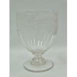 An early 19th century glass pedestal vase with wheel engraved decoration of wheat and hops over a