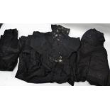 A collection of Victorian and Edwardian black silk ladies clothing and fragments, including a