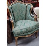 A 19th century French giltwood armchair in the 18th century taste.