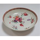 A 18th/19th century enamel decorated porcelain saucer dish by Newhall, diameter 12cm (chip to rim).