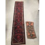A middle eastern hand knotted wool runner with three medallions with geometric designs and in