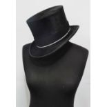 An early 20th century moleskin top hat by Canonne, internal measurements 20 x 16cm.