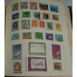 An amateur stamp album, mostly used examples, early 20th century to modern.