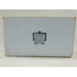 Cartier, 1940s or earlier, a pale blue cardboard presentation box, 10.8 x 6.2 x 4cm.