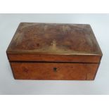 A Victorian burr walnut veneered brass inlaid, hinge lidded jewellery box, the lid inlaid with