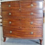 An early 19th century mahogany bow front chest of drawers of typical form on splay feet, width