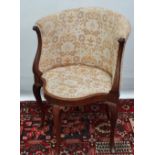 An Edwardian mahogany serpentine front and inlaid corner chair with cabriole legs.