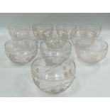 A set of eleven wheel engraved glass rinsing bowls, decorated with hops and barley, diameter 12cm.