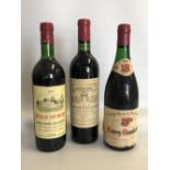 A bottle of Chateau La Lagune Haut Medoc 1970, together with a Gevrey Chanbertin Bourgogne 1969