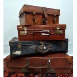 Four vintage leather suitcases, the largest width 66cm.