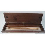 A brass and chromium plated rolling rule within pine fitted case, together with three drawing