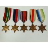 Five WWII unattributed Star medals.