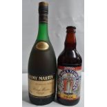 A bottle of Remy Martin cognac, together with a Skinners Bishop Bill beer No.0020.