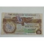 A States of Guernsey Bull five pound note.