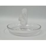 A Lalique glass pin dish with central squirrel, inscribed 'Lalique France' to the base, diameter