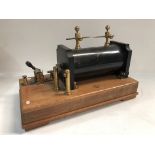 A 9 inch induction coil on wooden base, circa 1930.