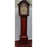 An eight day longcase clock with 12 inch painted arch dial, indistinctly signed Geach St Columb,