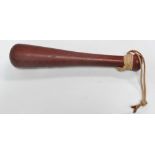 A turned wood truncheon, length 31cm.