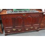 A George III oak four panel mule chest with rising lid and fitted two drawers on bracket feet, width