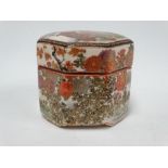 A Japanese Meiji period Satsuma octagonal section lidded box, the lid painted with four geisha