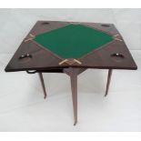 An Edwardian mahogany and inlaid envelope card table.