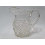 A 19th century cut glass helmet shaped jug, height 18cm.