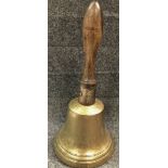 A early 20th century brass hand bell, height 38cm.