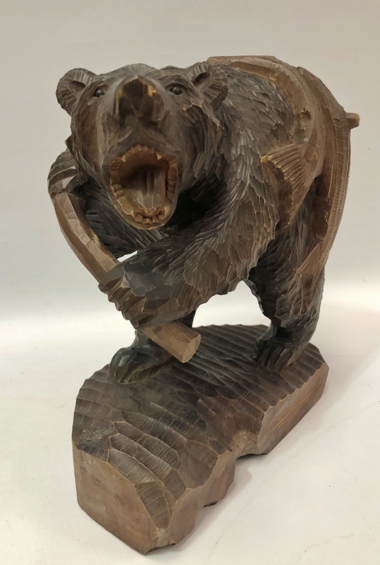 An oriental carved wood bear with two fish on his back, inscriptions to the back, height 36cm. - Image 2 of 3