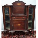An Edwardian mahogany and inlaid display cabinet raised on cabriole legs, width 111cm.