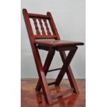 A child's hardwood folding chair.