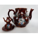 A Victorian barge ware teapot of typical decoration and with a tide tablet signed MRS F MANN