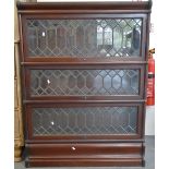A three section mahogany Globe Wernicke style bookcase with lead glazed doors, width 87cm.