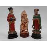 A pair of Chinese carved wood and painted sage figures, height 12.5cm, together with a Chinese