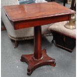 A late Victorian mahogany occasional table fitted a single drawer on tapering stand and platform