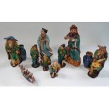 A collection of seven Chinese earthenware figure groups, together with two 20th century Chinese