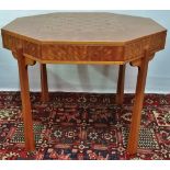 A Cathedra octagonal satin timber and inlaid games table, stamped to the base 'Cathedra 1980', the