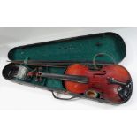 A Stradivarius copy violin with 13.25inch back, the button stamped J.T.L, with nickel mounted bow
