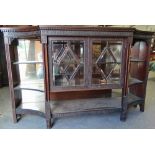 An Edwardian mahogany side cabinet in the Chippendale style, width 175cm.
