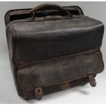 An early 20th century black leather Gladstone bag, width 38cm.