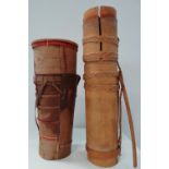 Two ethnic tribal bamboo dart quivers, the longest 30cm.