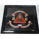 A WWI oil on black cloth regimental panel, inscribed 'To Ribbons 281 ARMY TROOPS COY SOMME FLANDERS'