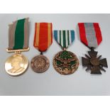 A WWII French medal 'Theatres D'Operations Exterieurs', together with an American Military Merit