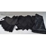 A Victorian lilac silk skirt, length 92cm, a Victorian black cotton and silk stitch cape, a ladies